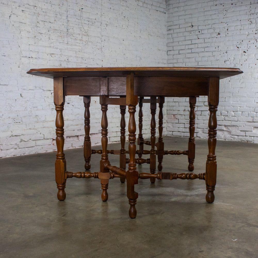 Late 19th to Early 20th Century William & Mary Style Dining Table Walnut Drop Leaf Expanding Gateleg by Abernathy