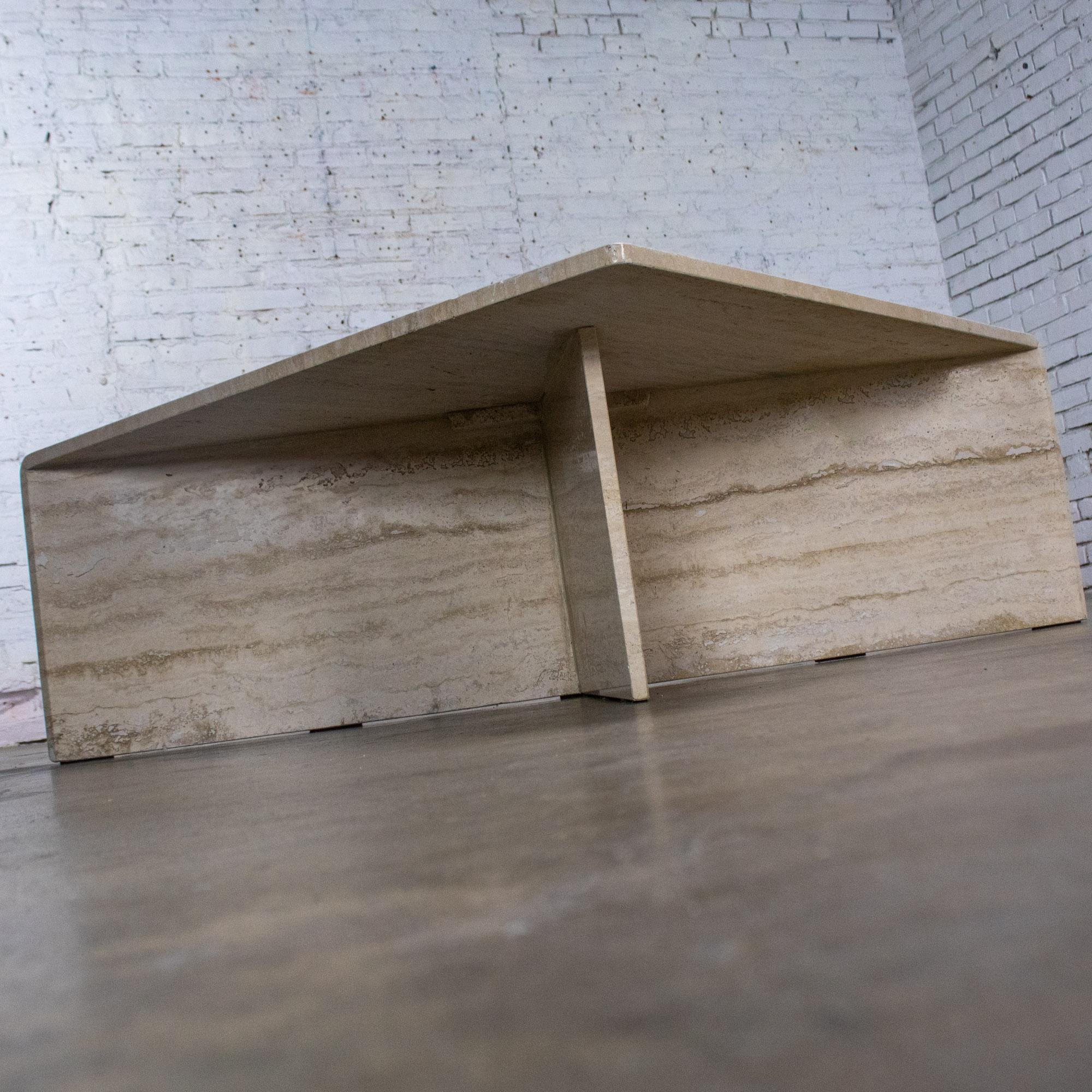 Late 20th Century Modern to Postmodern Triangle Travertine Coffee or Cocktail Table Style of Up & Up